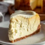 Delicious easy creamy cheesecake topped with fresh fruits and whipped cream