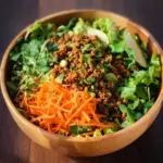 Colorful Egg Roll Salad in a bowl with fresh vegetables and toppings