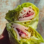 Healthy and delicious lettuce wrap filled with fresh ingredients