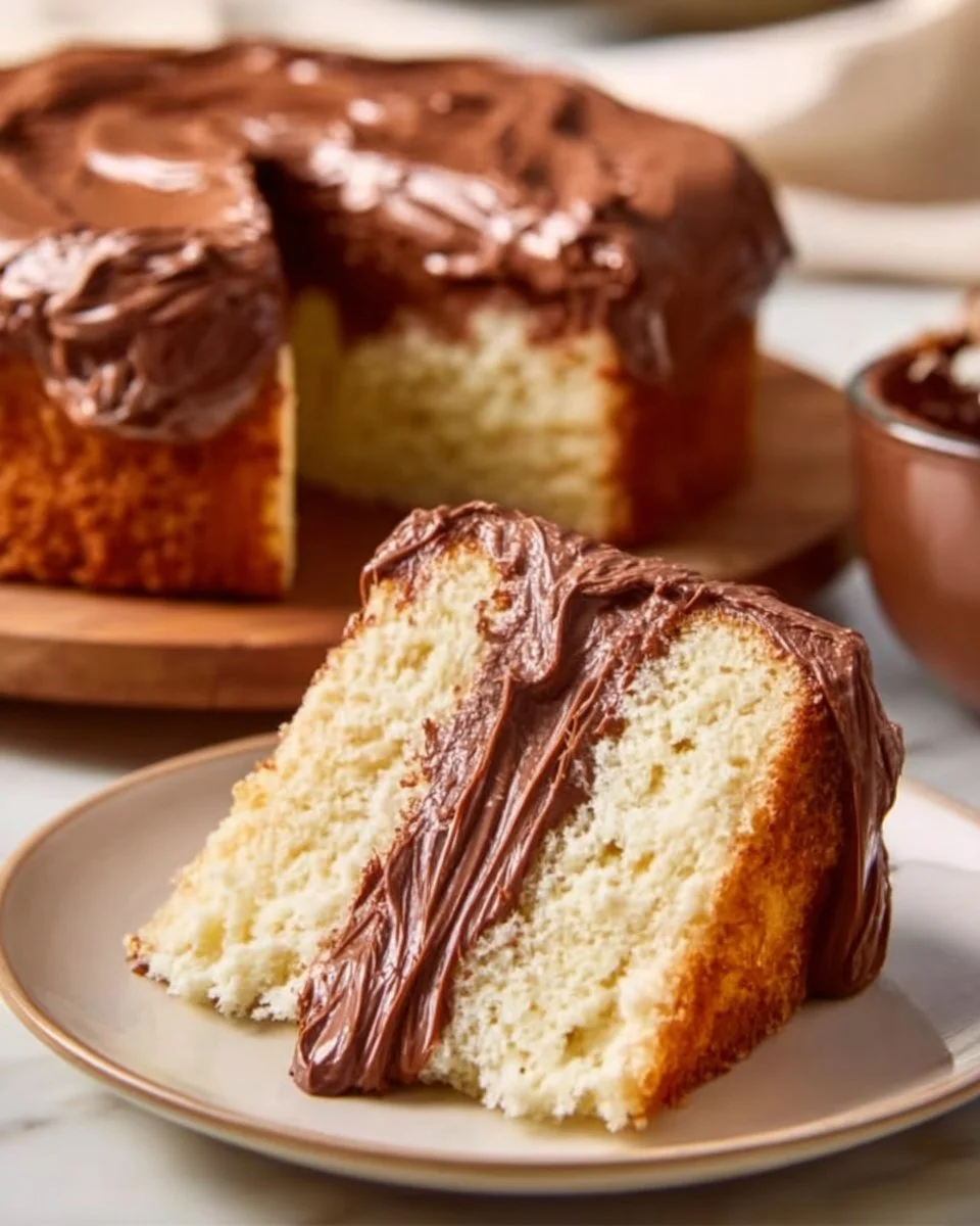 Delicious chocolate Nutella cake filling drizzled over dessert.