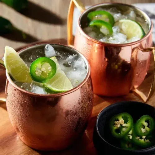 Mexican Mule cocktail with tequila, ginger beer, and lime garnish