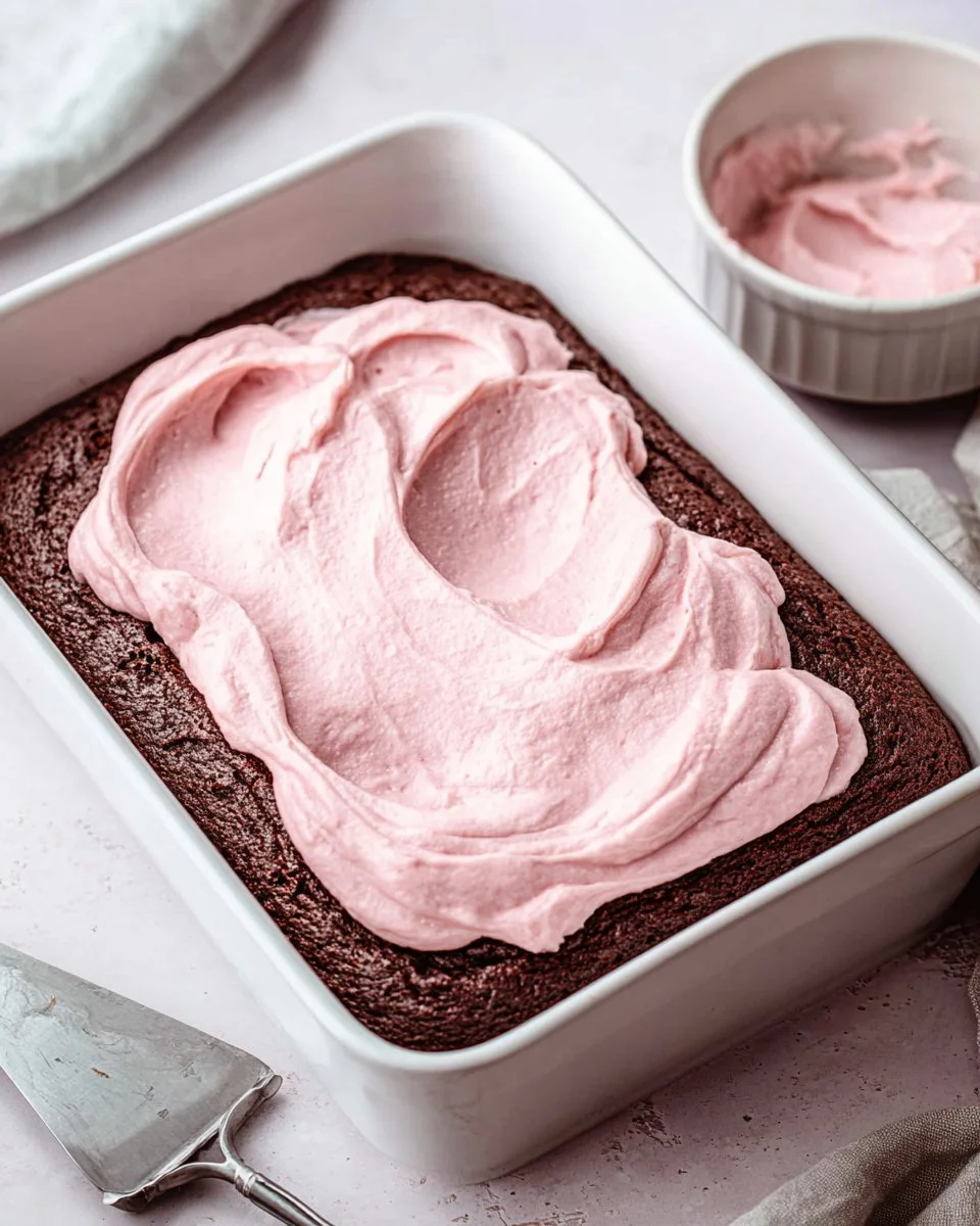 Delicious strawberry mousse brownies with rich chocolate base and strawberry topping.
